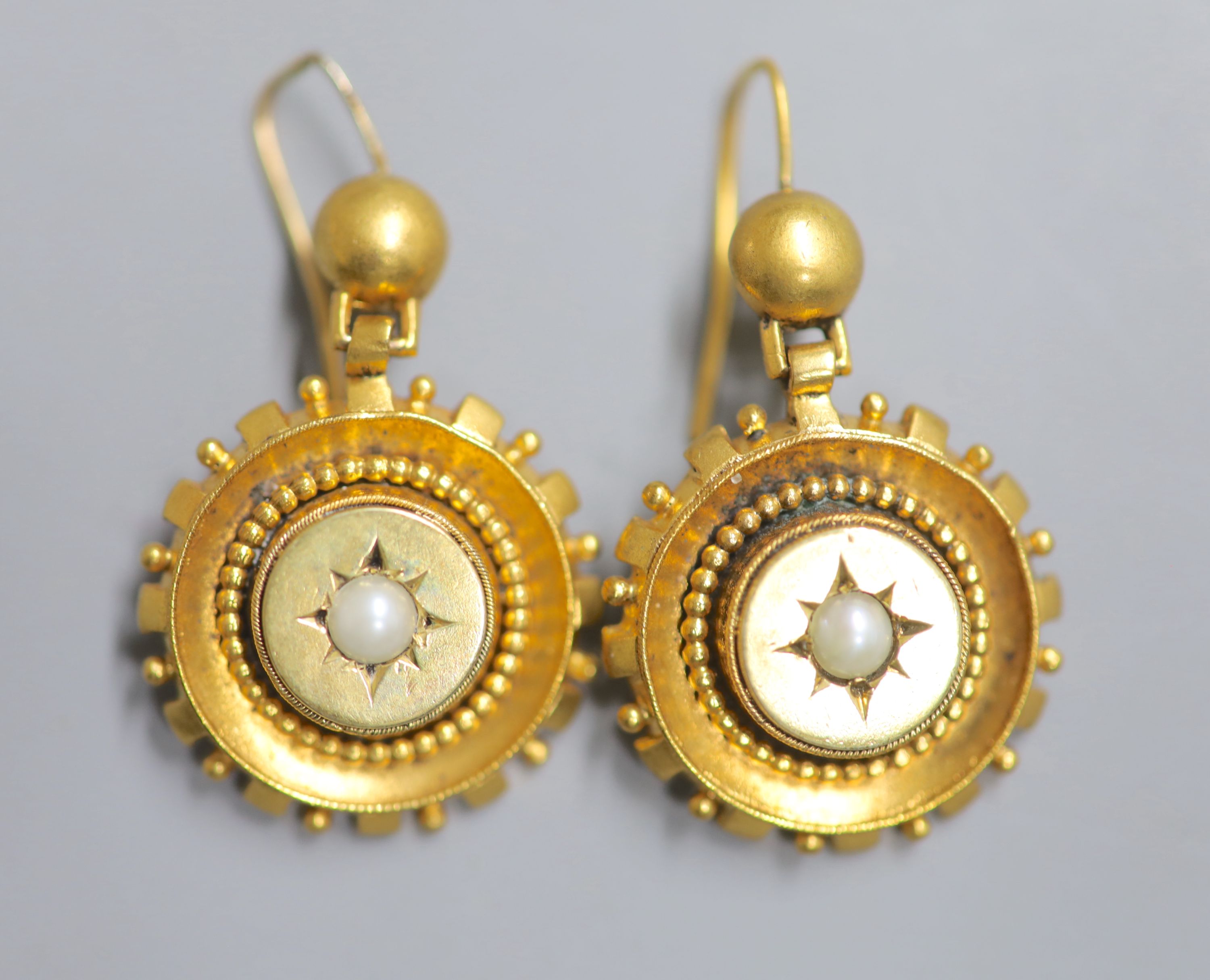 A pair of Victorian yellow metal and split pearl set target earrings, 20mm, gross 9 grams.